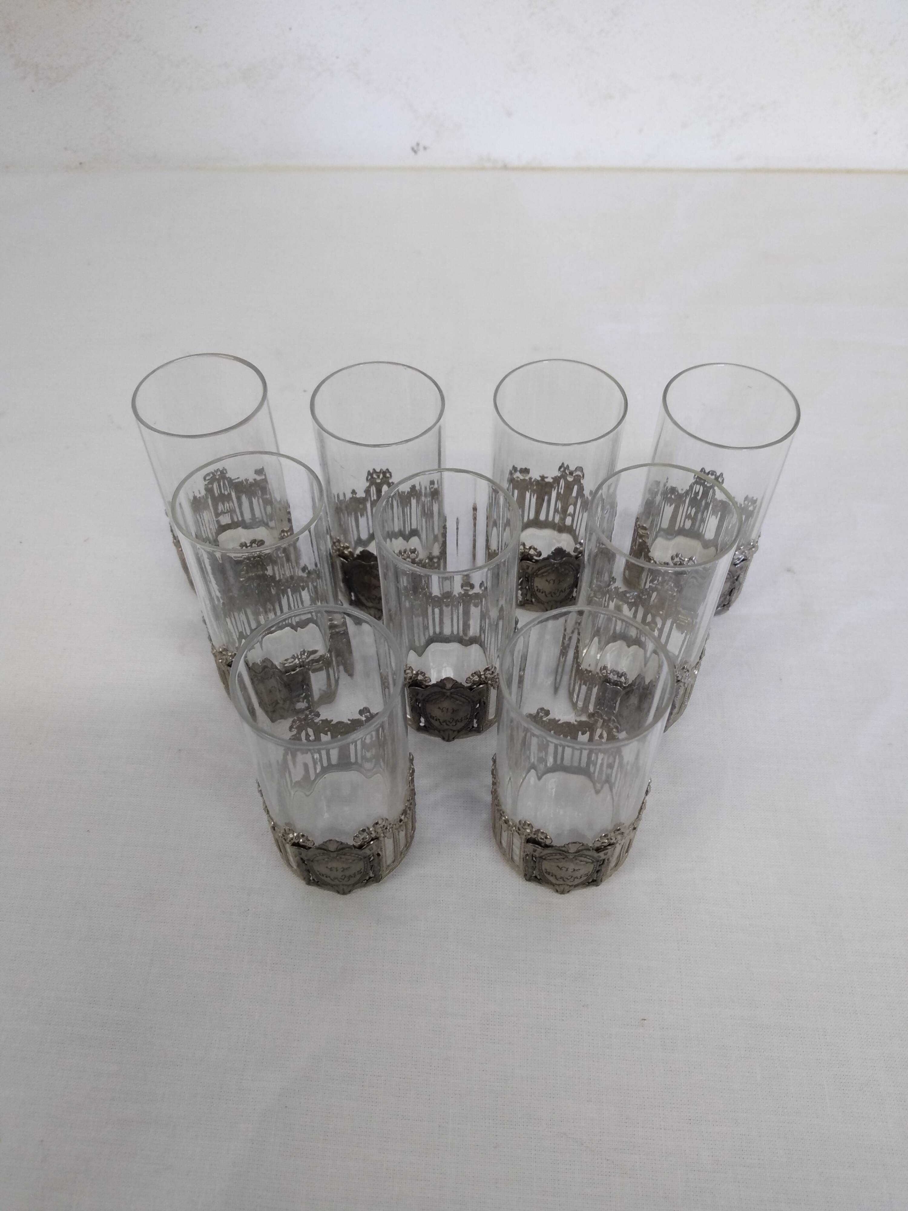 Glass with art deco strapping