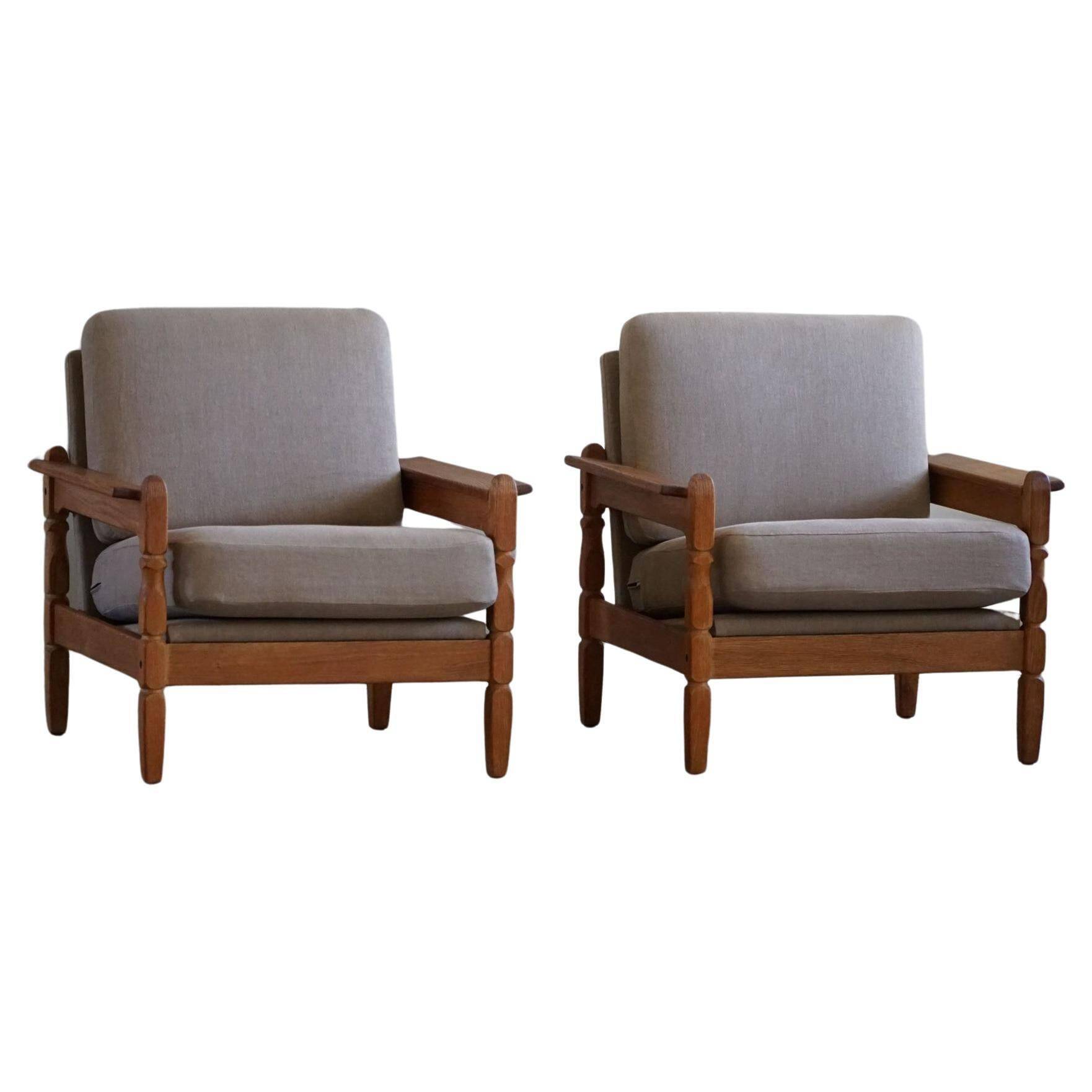 Modern Danish, Pair of Lounge Armchairs in Oak and Linen, Henning Kjærnulf, 1960s