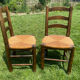 Pair of Georges Robert straw chairs