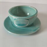 Earthenware bowl and saucer in glazed water green ceramic.