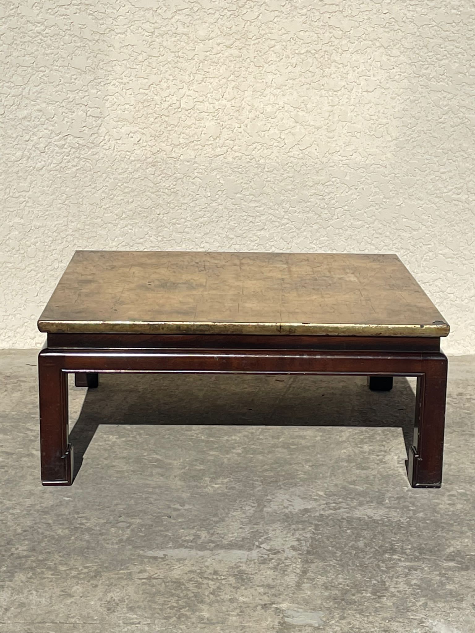 Coffee table covered with gold leaf
