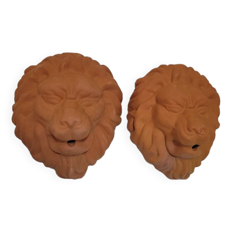 Two lion head fountains