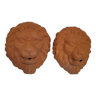 Two lion head fountains
