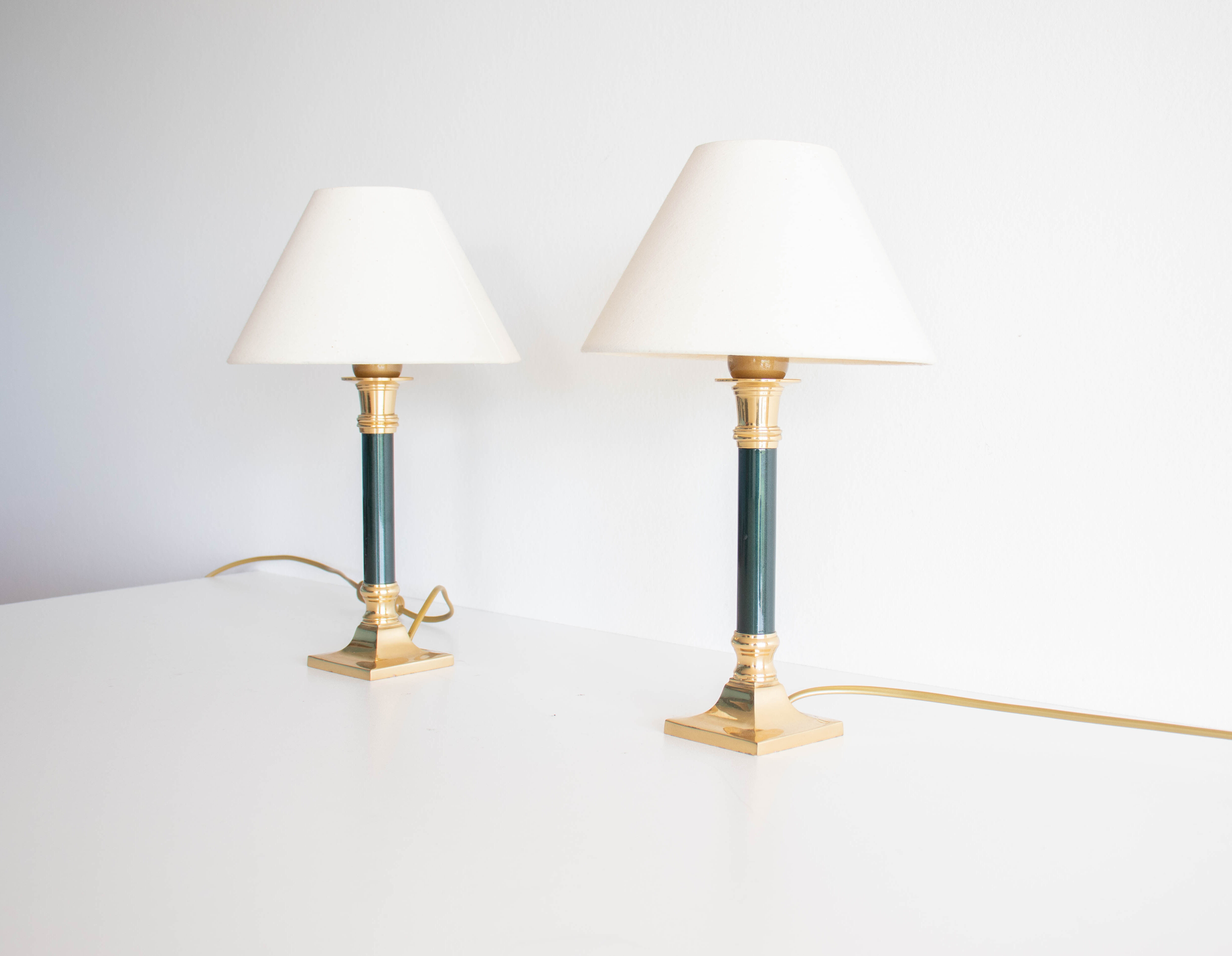 A set of two column lamps in hollywood regency style
