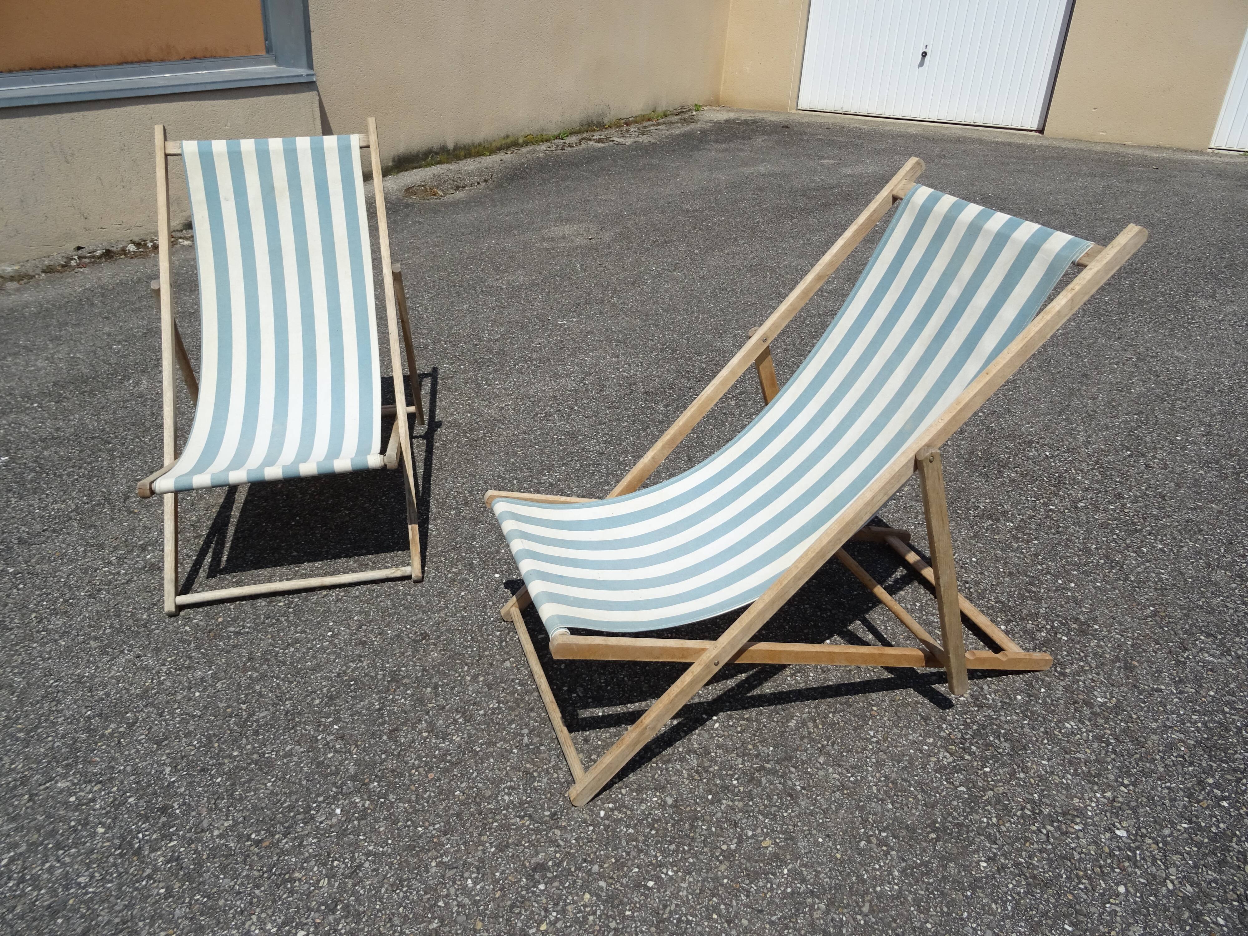 Pair of sun loungers with vintage blue blue stripes