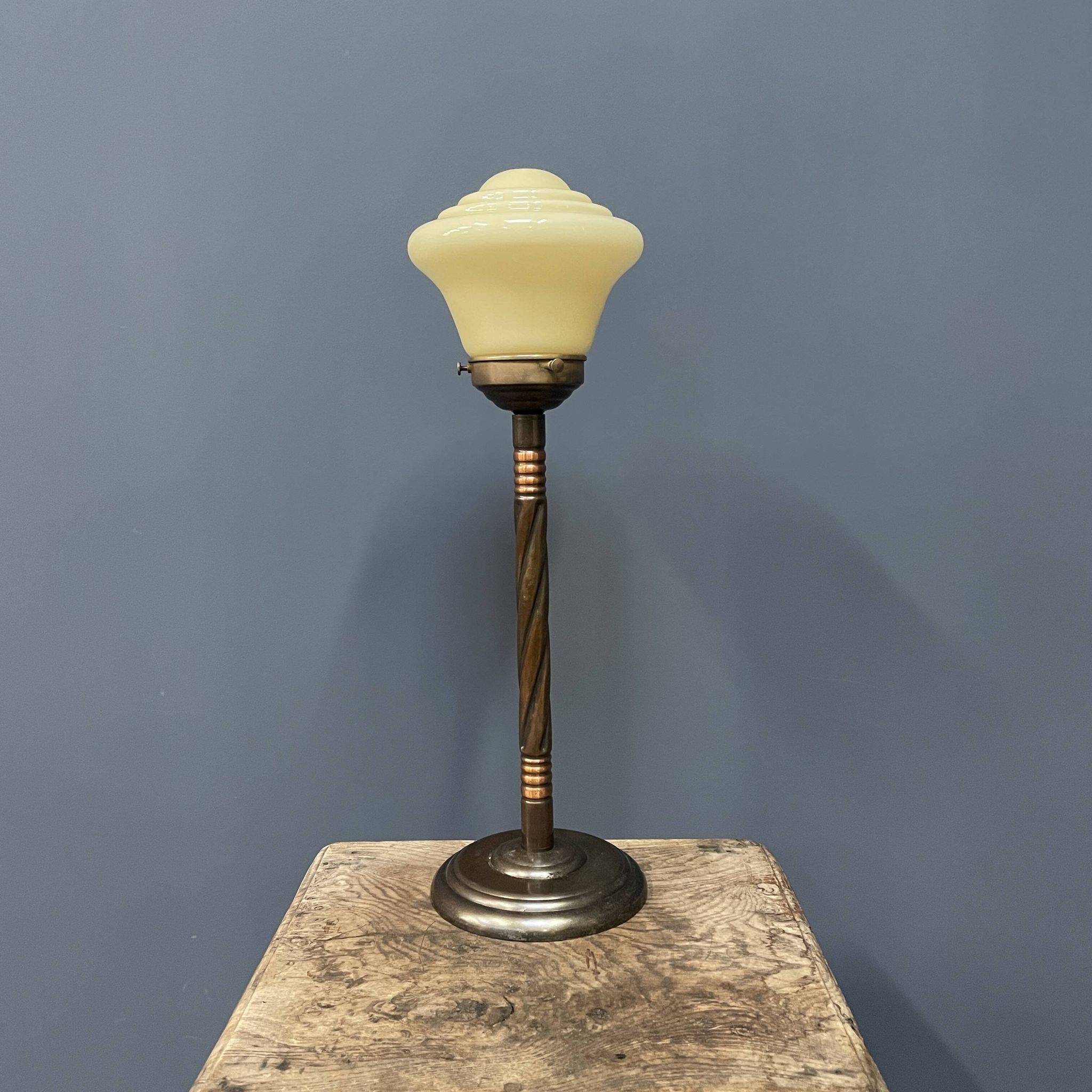 Standing copper table lamp with glass shade