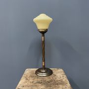 Standing copper table lamp with glass shade