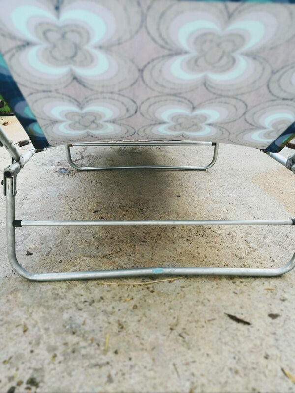 Camp bed or vintage sunbathing