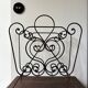 Vintage 50s cast iron magazine rack