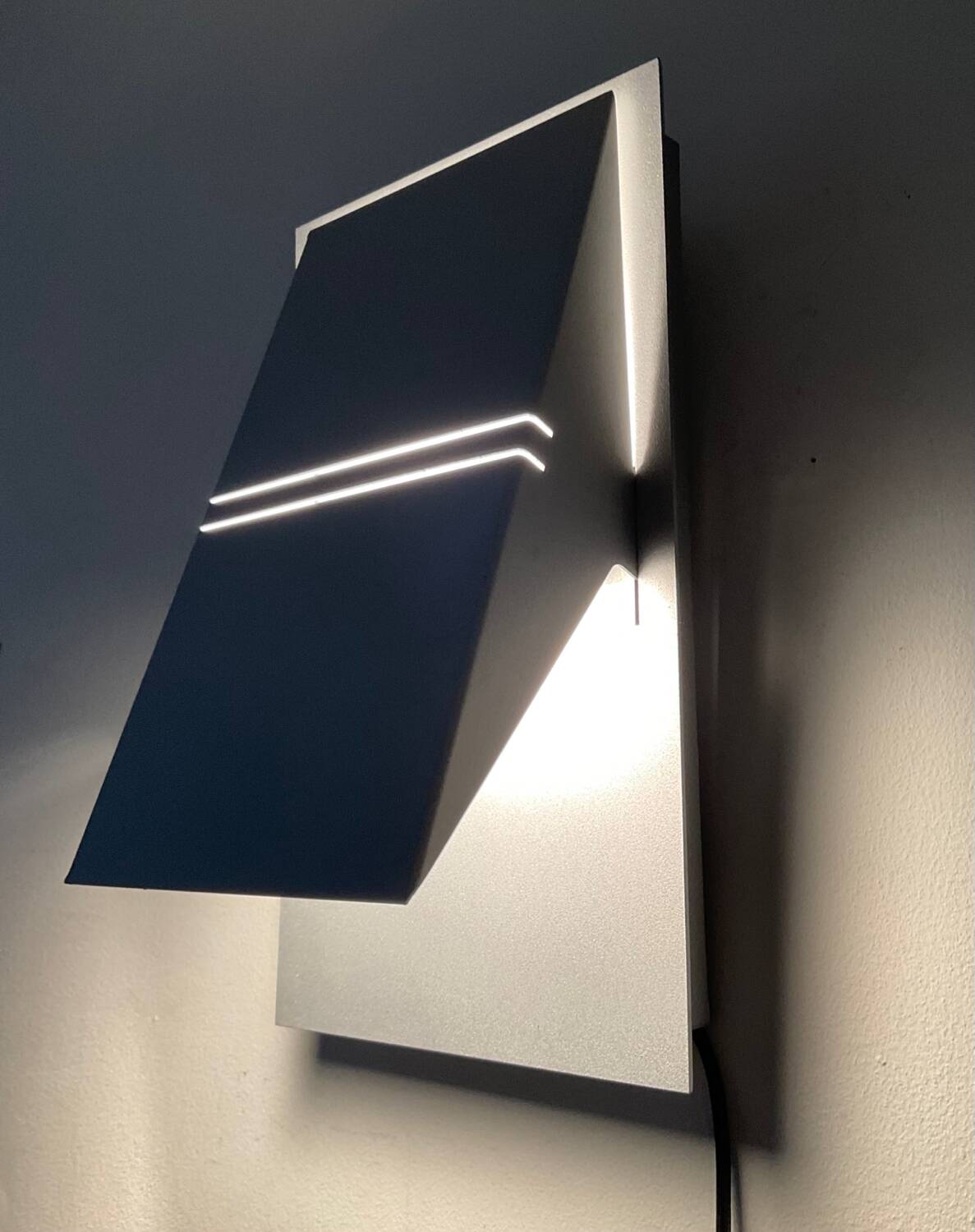 Pair of designer wall lights from the 80s-90s