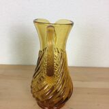 Twisted amber glass pitcher