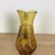 Twisted amber glass pitcher