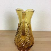 Twisted amber glass pitcher