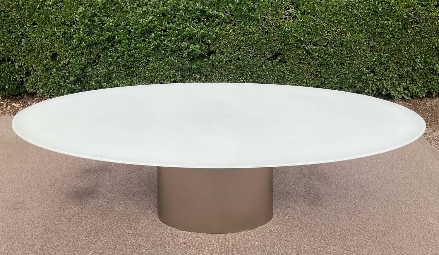 Oval designer dining table in frosted glass and brushed stainless steel