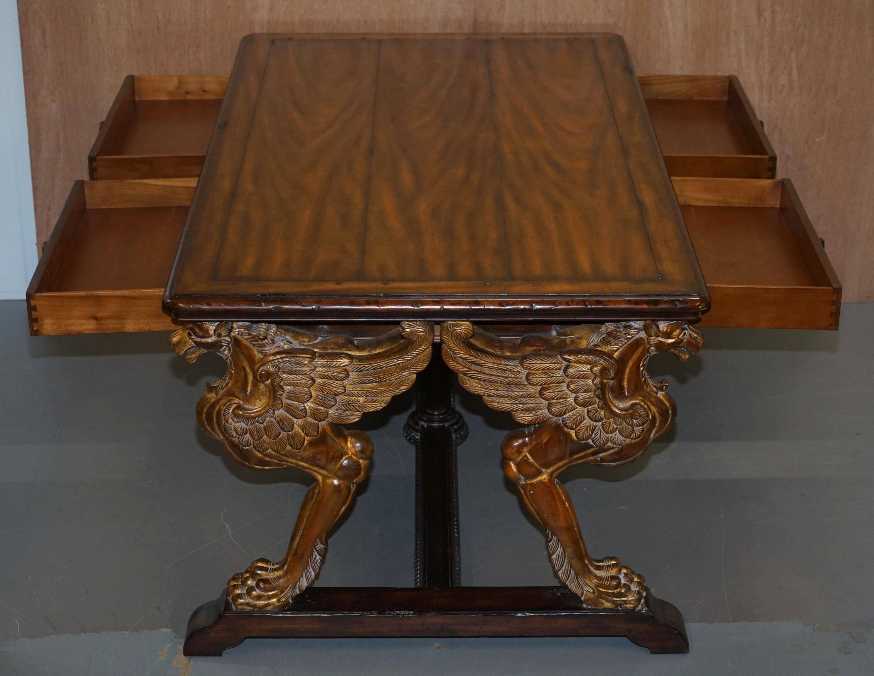 Double-sided writing desk in hardwood with gilt griffins, RJ Horner style.
