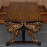 Double-sided writing desk in hardwood with gilt griffins, RJ Horner style.