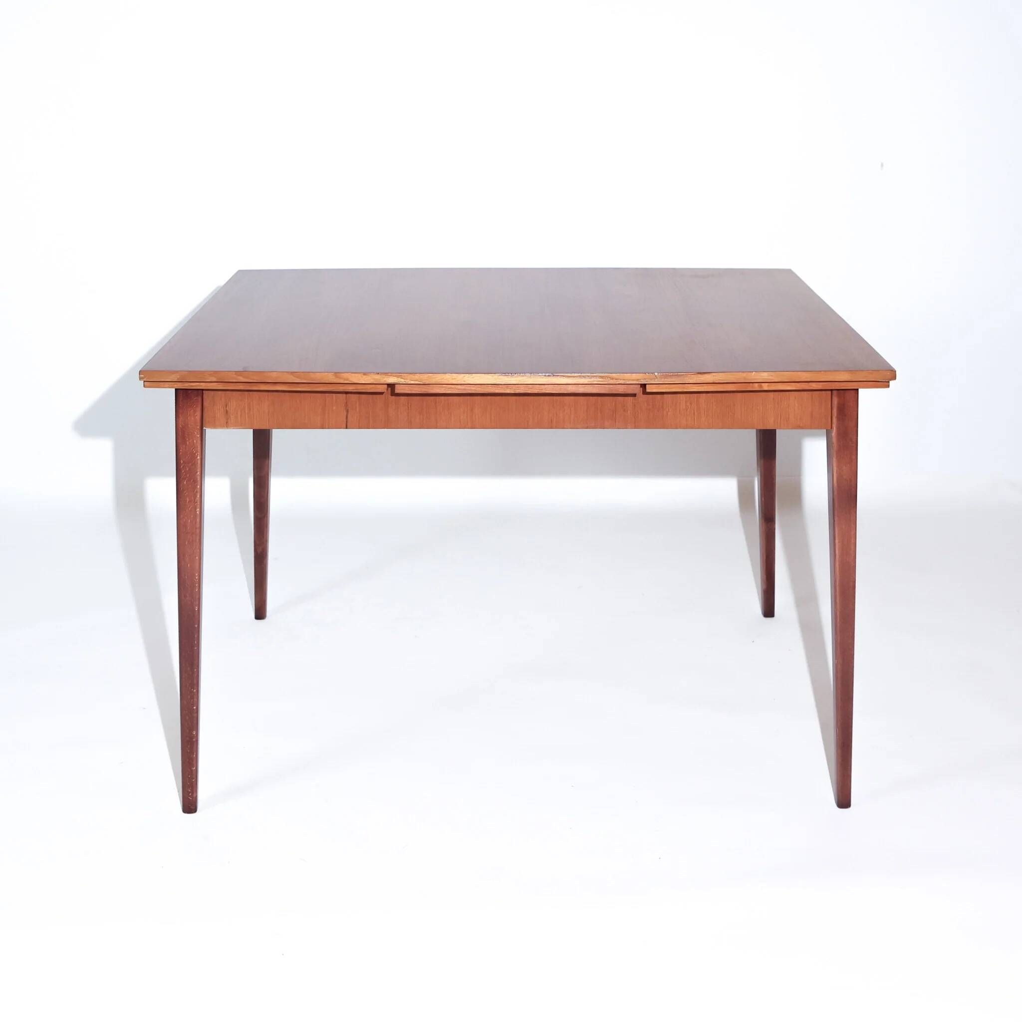 Mid-century modern Scandinavian dining table with extensions in teak, 1960s.