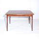 Mid-century modern Scandinavian dining table with extensions in teak, 1960s.