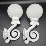 Pair of white enameled cast iron wall sconces, mid-20th century