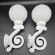 Pair of white enameled cast iron wall sconces, mid-20th century