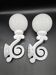 Pair of white enameled cast iron wall sconces, mid-20th century