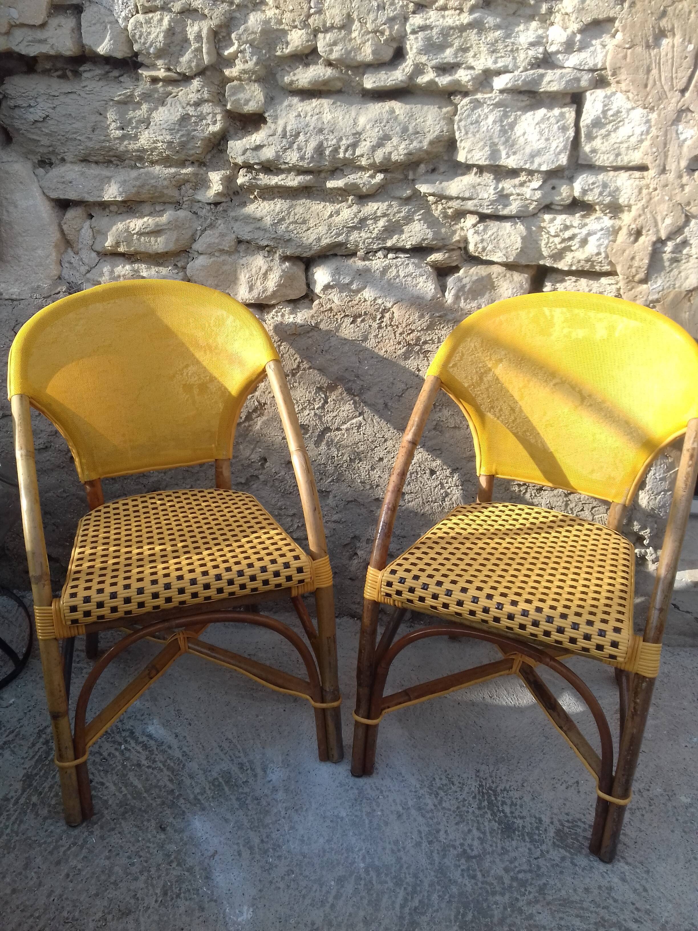 Two rattan bar armchairs