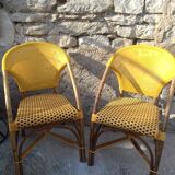 Two rattan bar armchairs