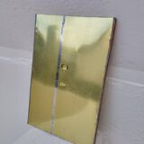 Golden oriental mirror