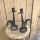 Signed zoomorphic iron candle holders