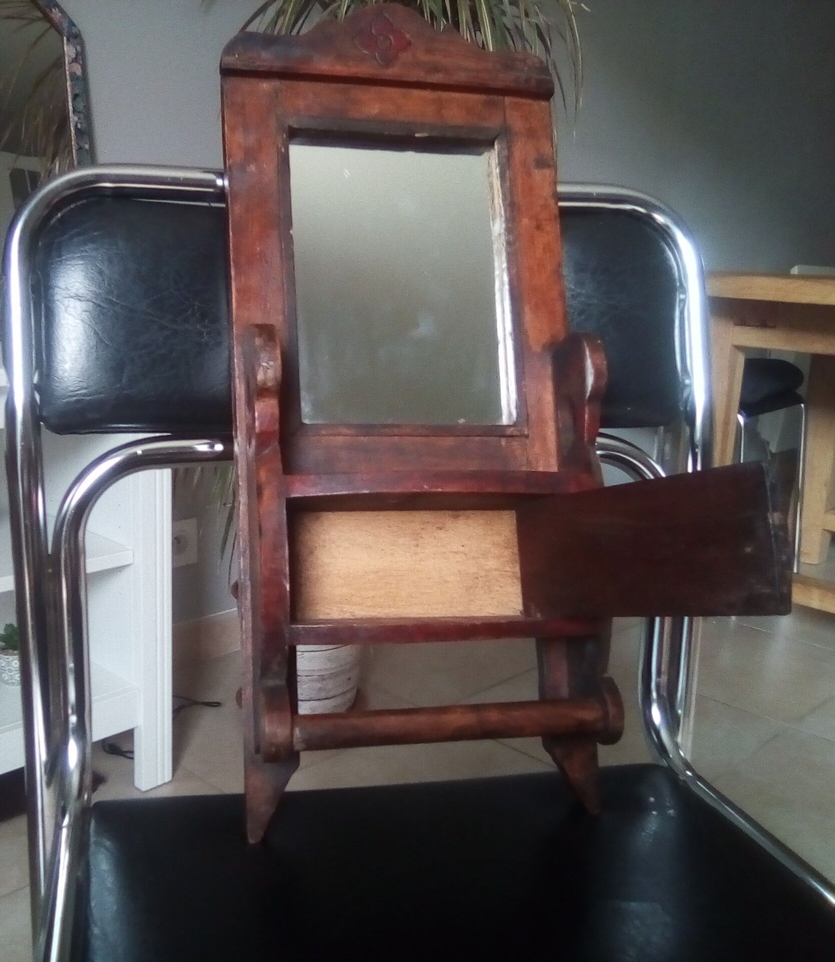 Old art deco barber mirror in teak
