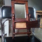 Old art deco barber mirror in teak