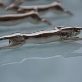 12 silver-plated metal "rabbit" knife rests