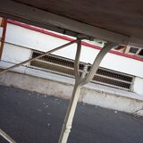 White bistro table in marble and cast iron