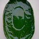 Oval flat decoration in relief