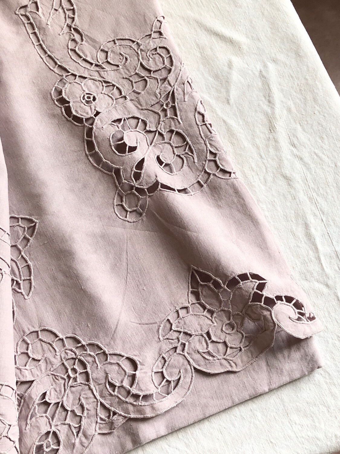 Old embroidered towel tinted purple aurora