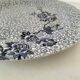 Round antique plate by Johnson Brothers in the Blue Lotus pattern.