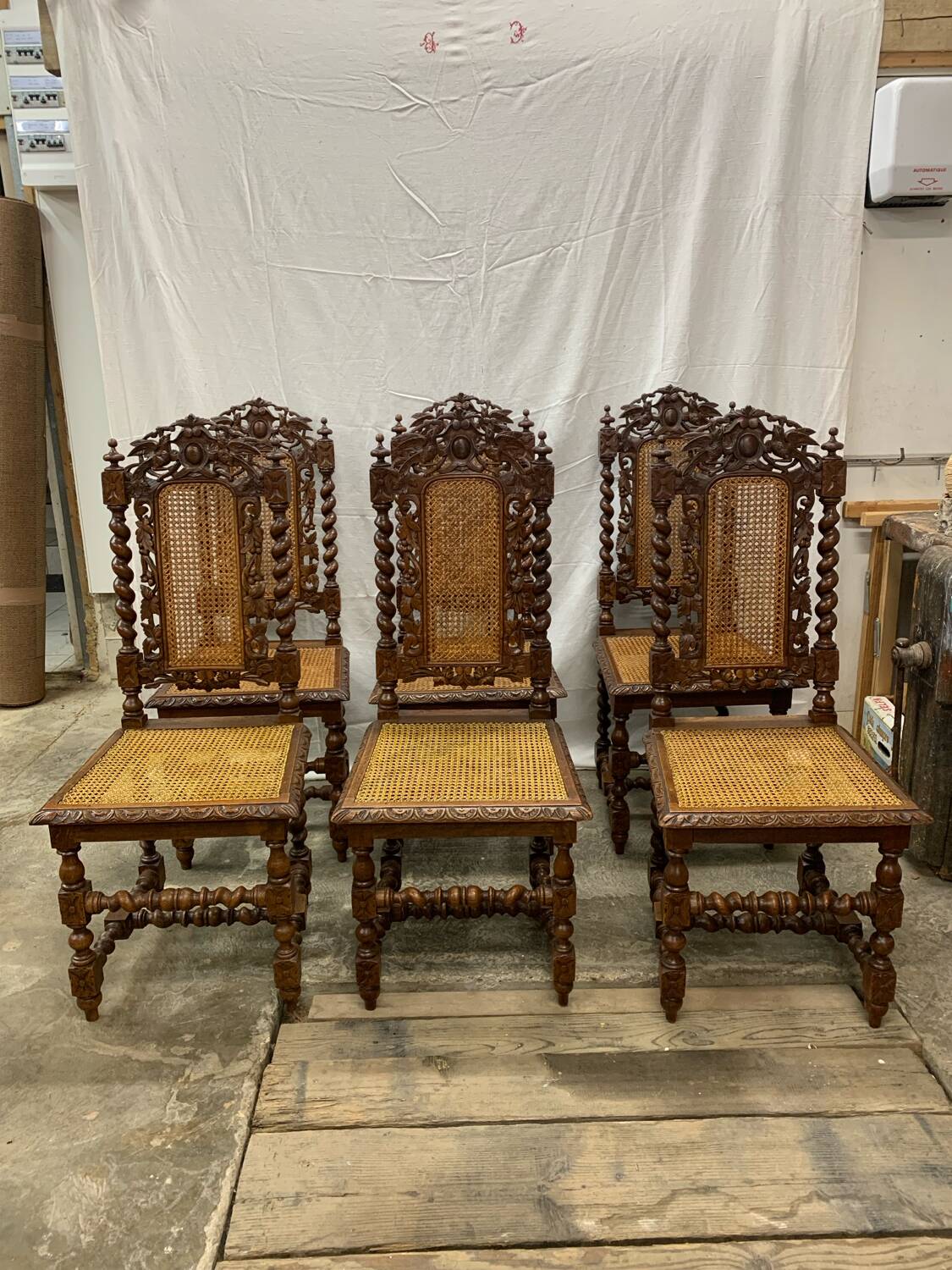 6 antique Henry II caned chairs