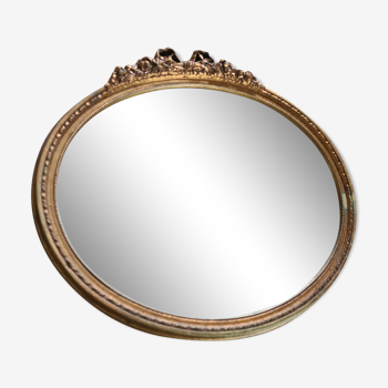 Ancien miroir ovale avec cadre doré