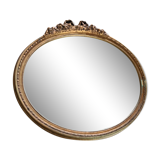 Ancien miroir ovale avec cadre doré