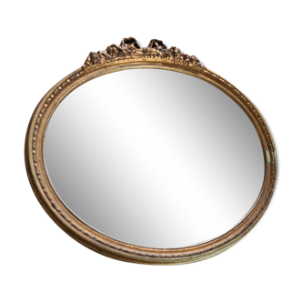 Old oval mirror with golden frame / Vintage
