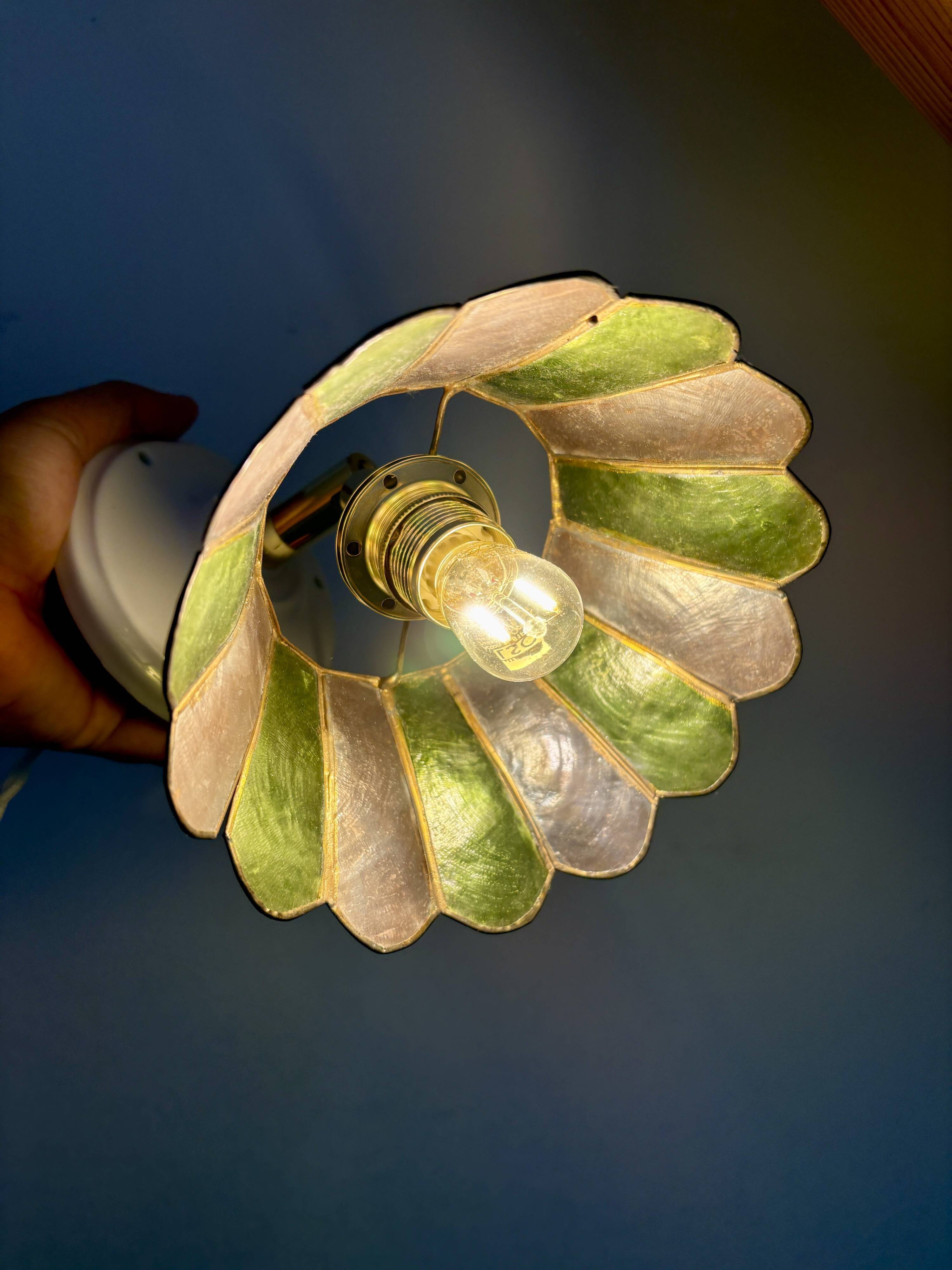 Vintage wall lamp with a green and pink mother-of-pearl lampshade