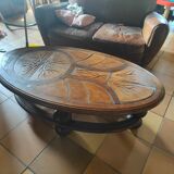Ceramic and wood table in the shape of trees in the style of capron style