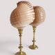 Pair of natural shells on a mid-century Swedish Skultuna brass candelabrum.