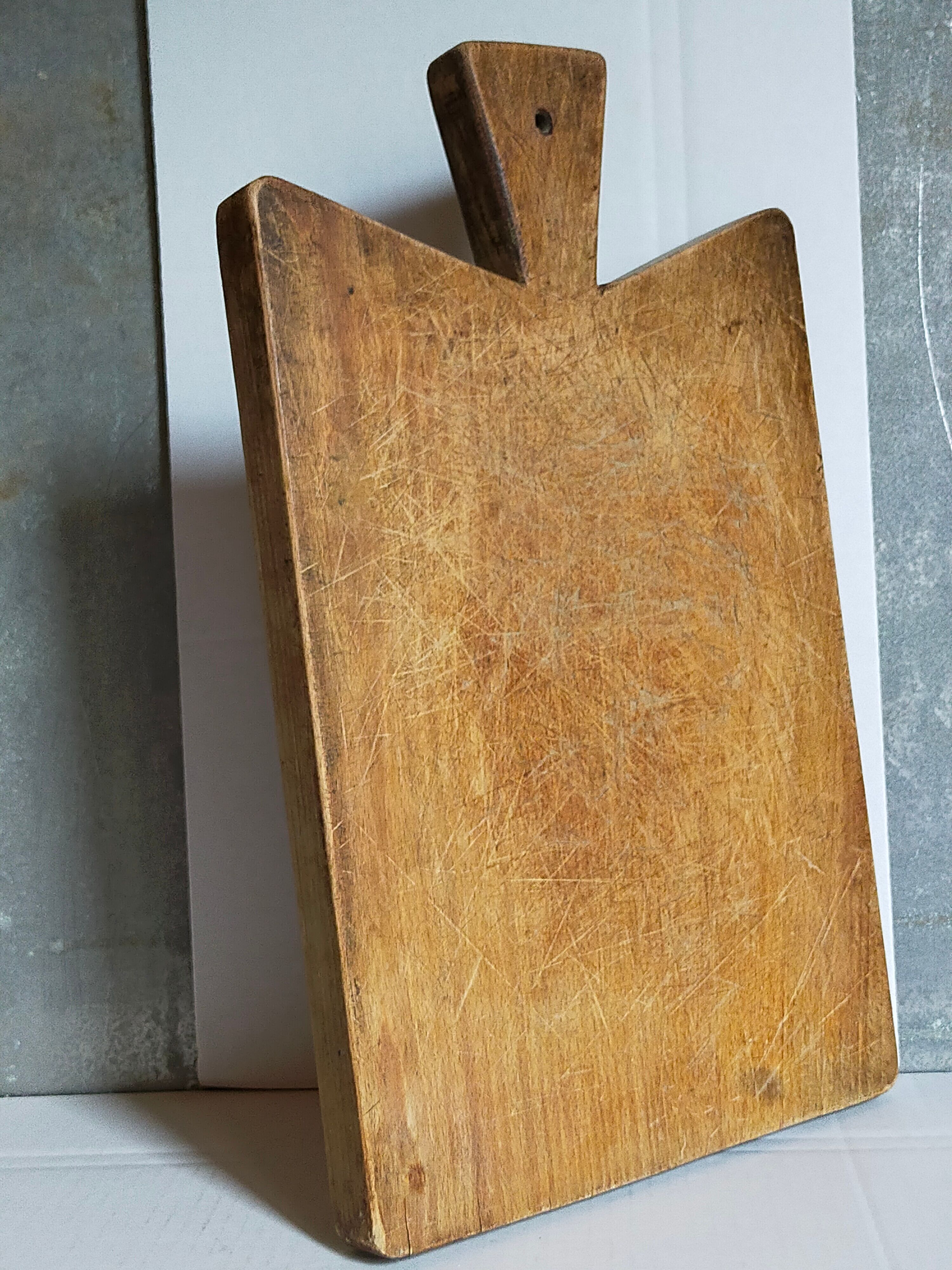 Cutting board in old solid wood