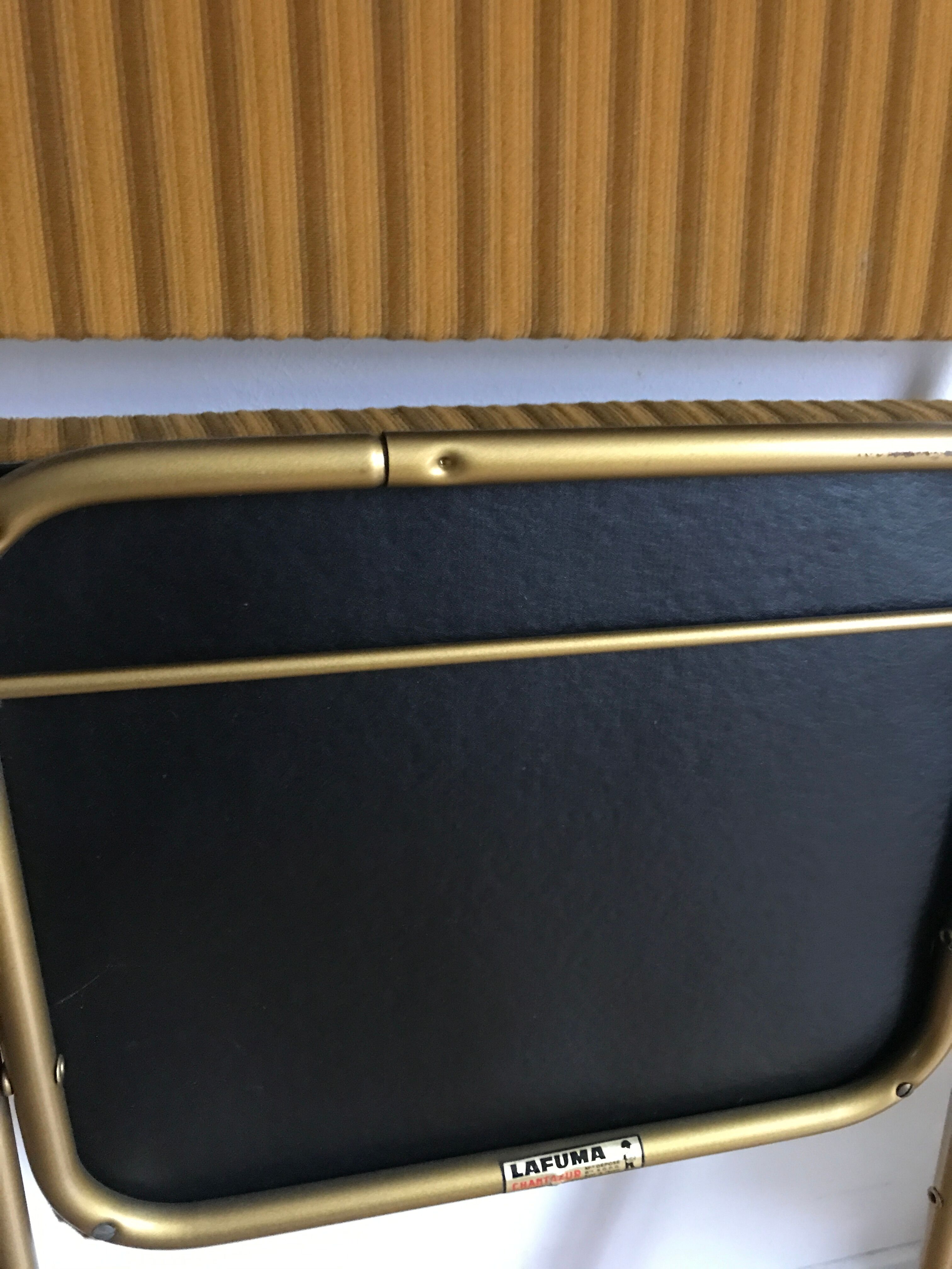 Vintage folding chair lafuma chantazur with striped gold fabric