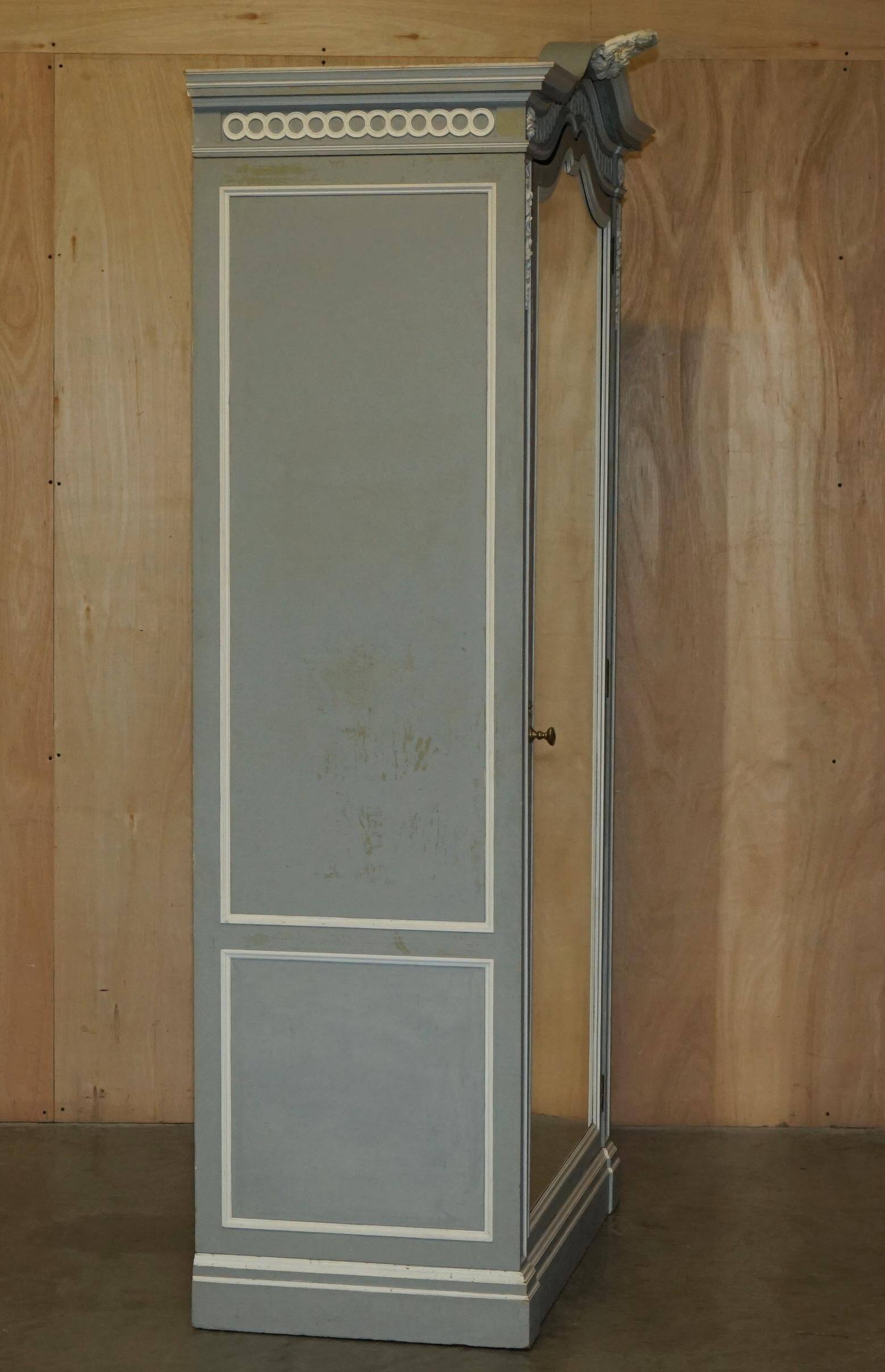 Antique wardrobe Mellier & Co with mirror door