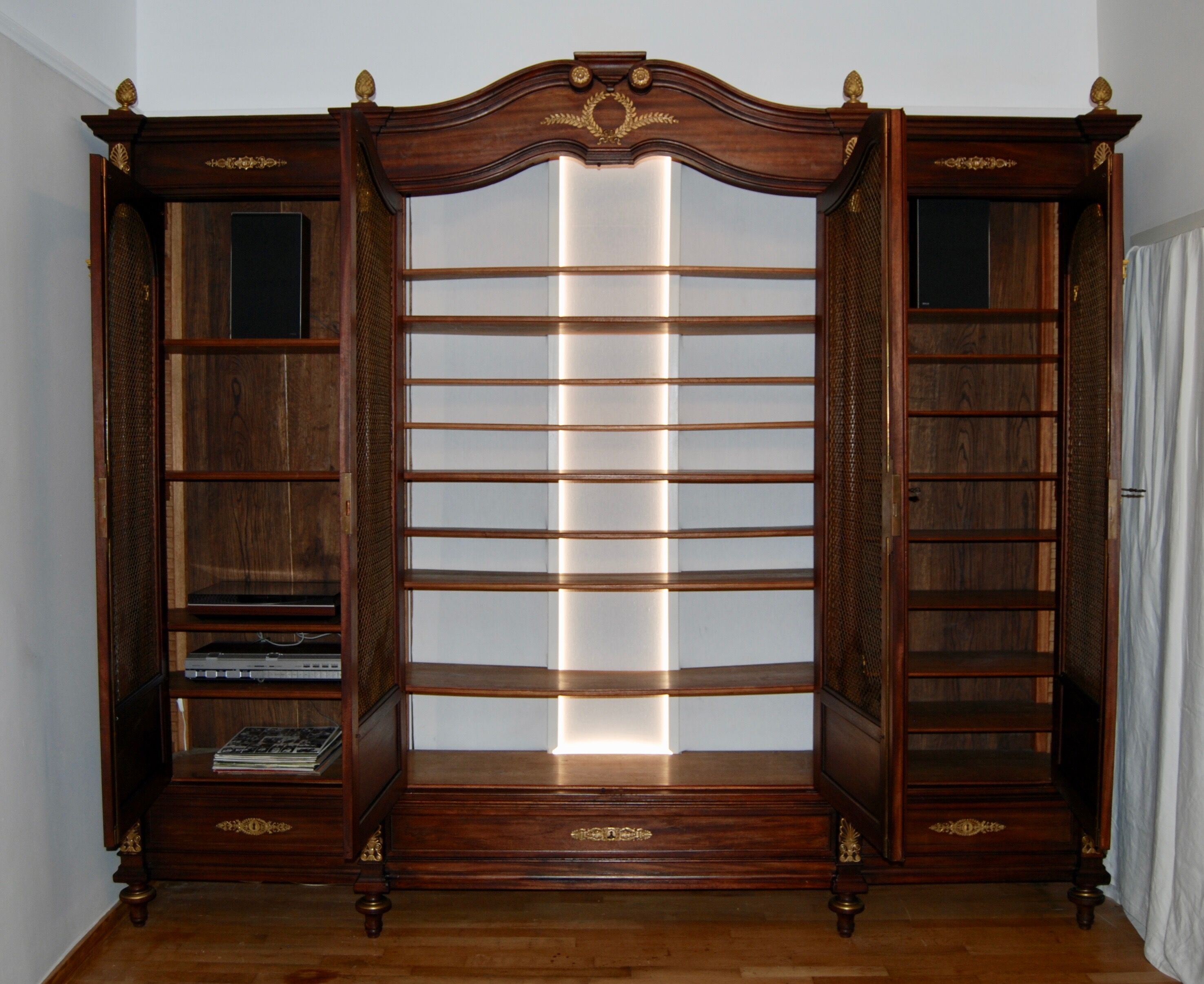 Large Empire library in solid mahogany, late nineteenth century