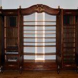 Large Empire library in solid mahogany, late nineteenth century