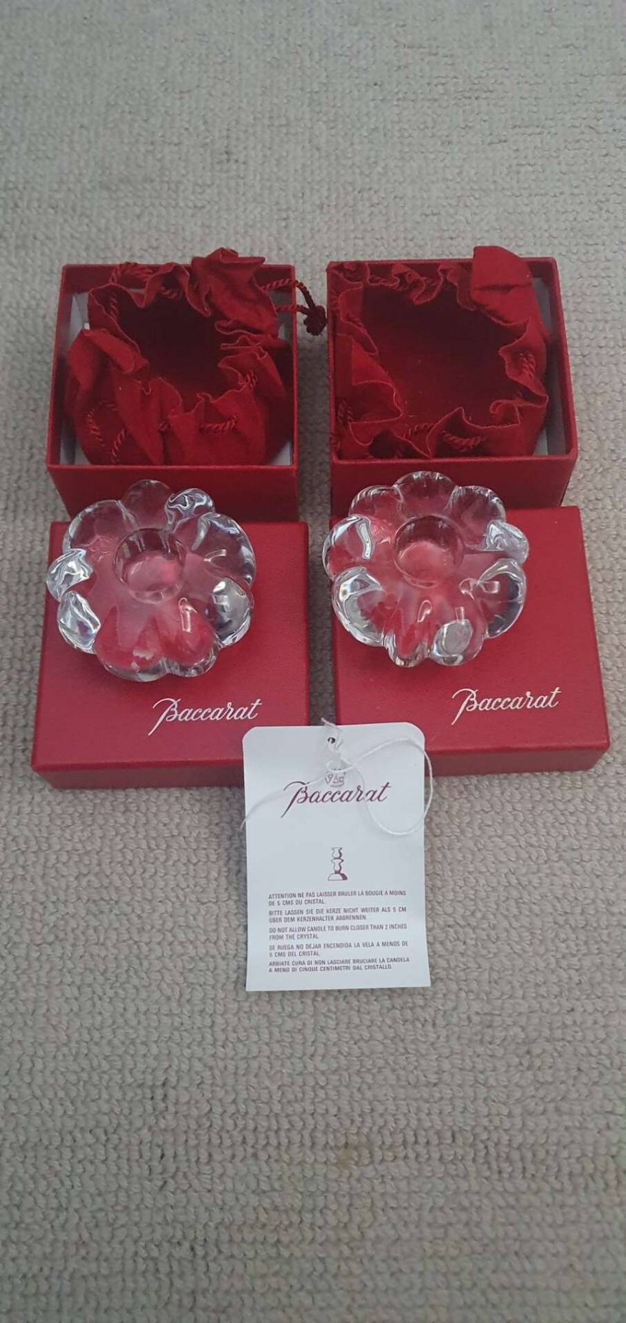 Pair of Baccarat crystal candlesticks, flower/rose model — new condition