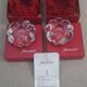 Pair of Baccarat crystal candlesticks, flower/rose model — new condition